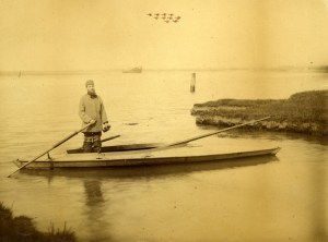 Albert Beckett, standing on a punt in Breydon Water. Image courtesy of Picture Norfolk